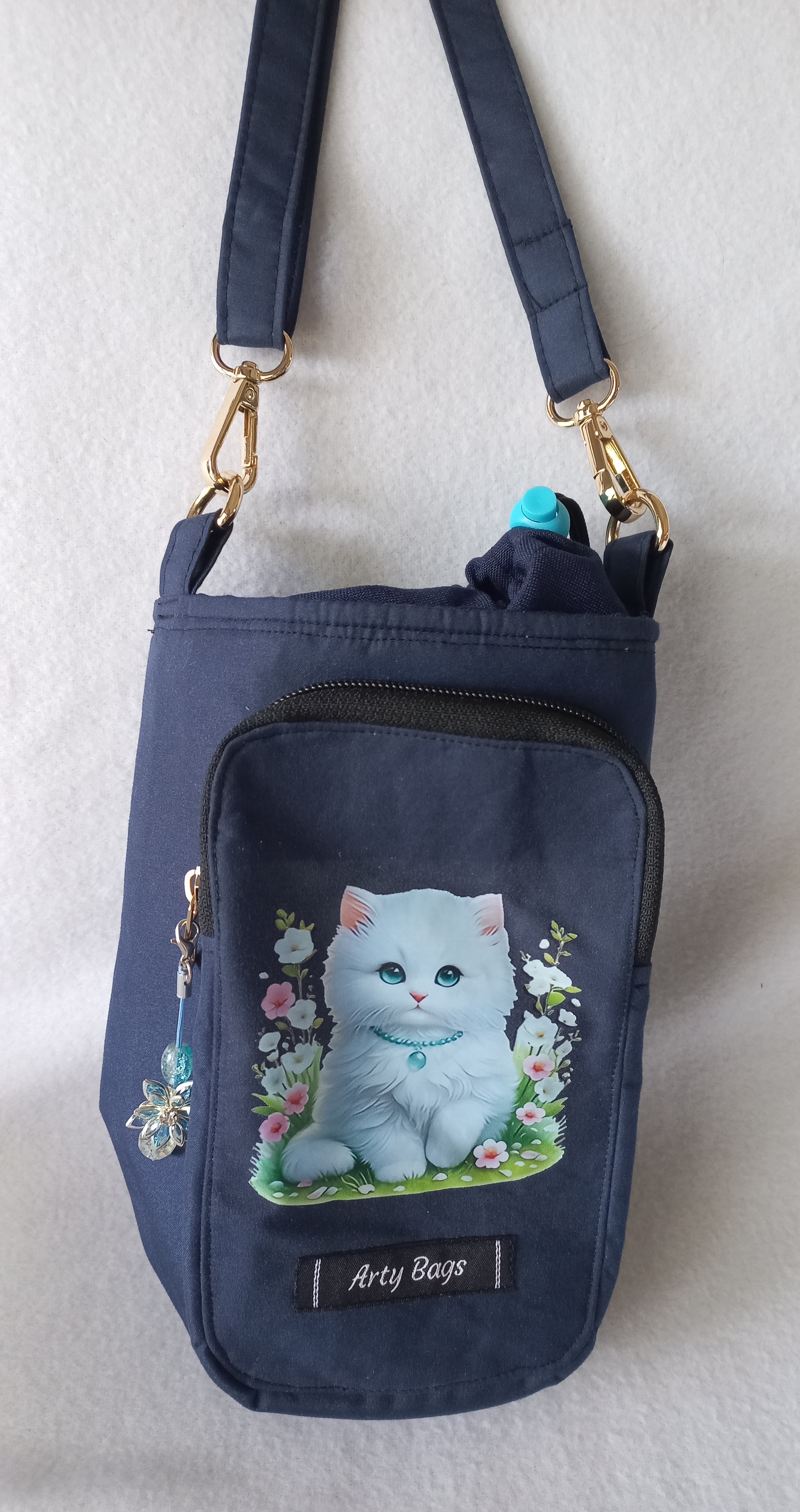 Wanda, water bottle & mobile phone